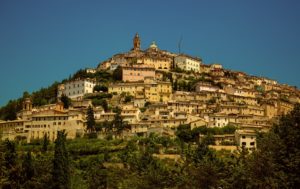 Italian medieval town on top of rocky slope